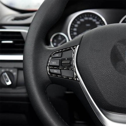 Carbon Fiber Decorative Sticker for BMW Steering Wheels applied to black BMW steering wheel buttons for subtle interior refresh