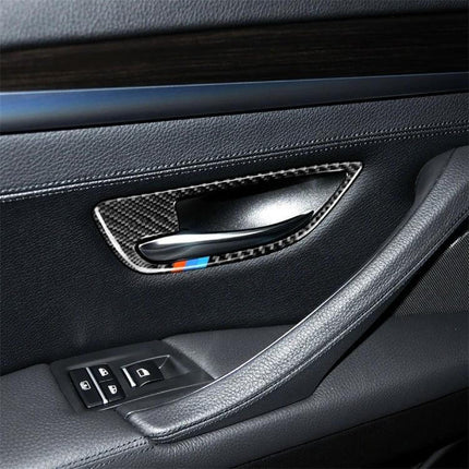 Carbon Fiber Decorative Stickers for BMW 5 Series Door Handles applied to interior door handle trim protecting from scratches and enhancing style