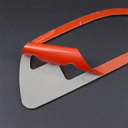 Carbon Fiber Decorative Stickers for BMW 5 Series Door Handles - close-up of adhesive-backed carbon fiber sticker being peeled, scratch protection and sleek finish