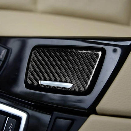 Carbon Fiber Ashtray for BMW 5 Series with Three Colors installed in center console, carbon fiber finish, compact durable ashtray
