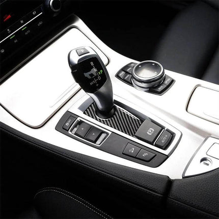 Carbon Fiber Decorative Sticker for BMW 5 Series Interiors applied to center console around gear shifter