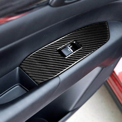 Carbon Fiber Decorative Sticker for Mazda CX-5 2017-2018 Right Drive installed on door panel around window switch, glossy carbon fiber finish