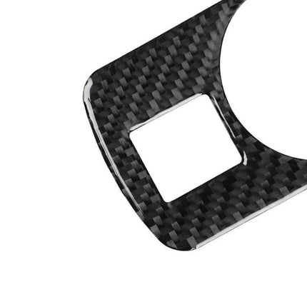 Carbon Fiber Decorative Sticker for Audi TT Headlight Switch - close-up of black carbon fiber texture and cutout for 2008-2014 Audi TT dashboard