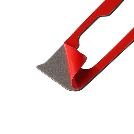 Carbon Fiber Decorative Sticker for Audi A3 Shift Frame — close-up peel of red-backed adhesive trim ready to apply