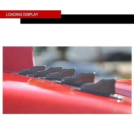 Universal EVO Style Shark Fin Car Roof Antenna Decoration on red car roof showing sleek carbon-fiber look and easy adhesive mount