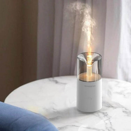 Candle Flame Aromatherapy Diffuser, Mini Humidifier on marble table with warm candle-like light and fine mist from 120ml tank, Type-C powered