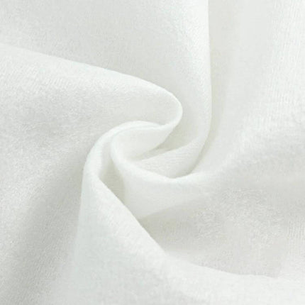 Candy Style Portable Disposable Cotton Towel 22x20cm For Daily Use - close-up of white unfolded water-activated cotton towel texture