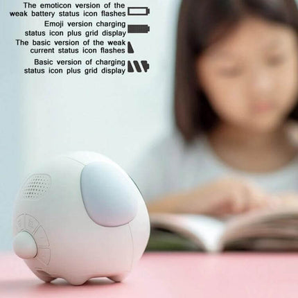 Cartoon Cmart Alarm Clock For Kids With Night Light on bedside table showing soft 3000K glow and dual alarm features, compact ABS silicone design