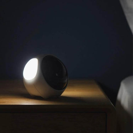 Cartoon Cmart Alarm Clock For Kids With Night Light on a bedside table showing warm 3000K glow and compact kid-friendly design