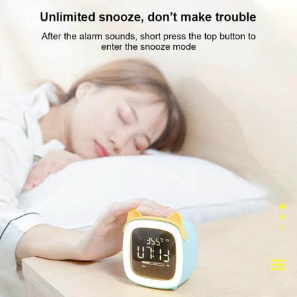 Cartoon Deer Alarm Clock For Kids USB Rechargeable on bedside table showing snooze feature with sleeping child