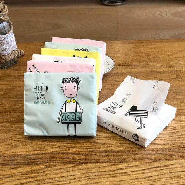 Colorful Cartoon Facial Tissues, 60 Sheets, For Household Use - pastel pack of 3-ply fragrance-free tissues with cartoon character on wooden table
