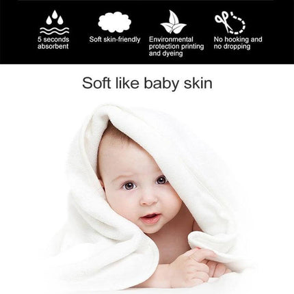 Coral Fleece Bath Towel, Wavy Edge, Quick Dry 70x140 cm wrapped around baby to show soft, absorbent, quick-dry 70x140 cm towel
