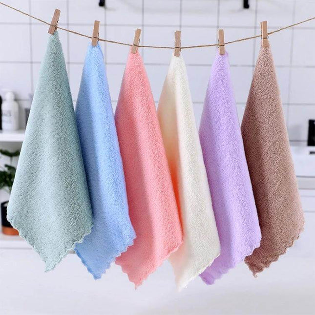 Coral Fleece Face Towel 30x30cm for Everyday Use at Home - six pastel coral fleece face towels hanging on a line, soft plush texture