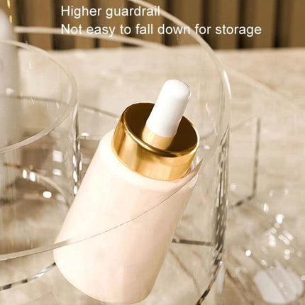 Cosmetic Storage Box With 360° Rotating Base For Easy Access shown holding a dropper bottle on a clear rotating organizer, high guardrail prevents falling