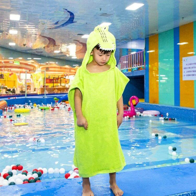Cotton Cloak Children's Bath Towel 70 cm Pink Unicorn - child wearing green hooded bath cloak by indoor pool, 100% cotton hooded towel for kids