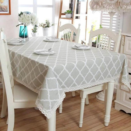 Cotton Geometric Rhombus Gray Lace Tablecloth For Everyday Dining on a 90x135 cm farmhouse table with plates and floral centerpiece