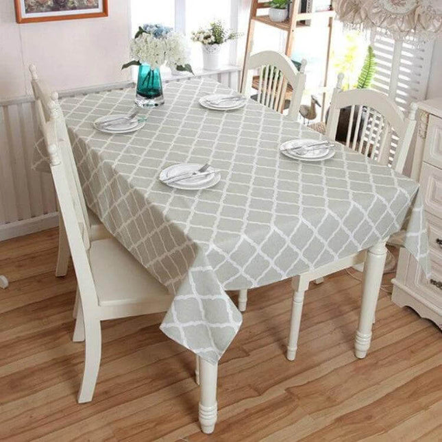 Cotton Gray Lace Tablecloth, Geometric Rhombus Pattern, 140x220cm on dining table with white chairs and place settings