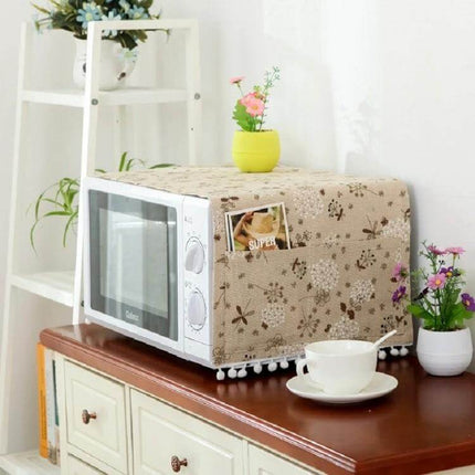 Cotton Linen Microwave Oven Dust Cover 30x90cm For Kitchen Use - beige floral cotton-linen cover protecting microwave, pocket for manuals, decorative pom-pom trim