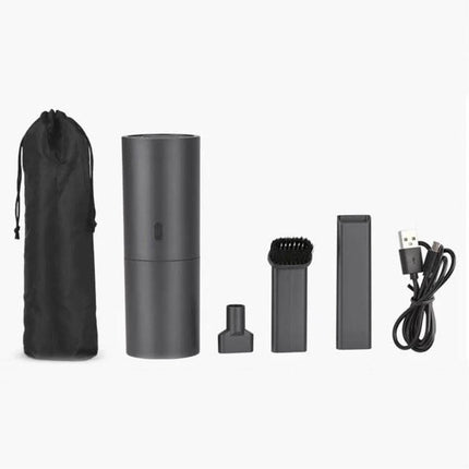 Creative Mini Handheld Vacuum Cleaner USB Charging for Quick Cleanups compact black kit with USB cable, brush and nozzles for desk and car cleaning