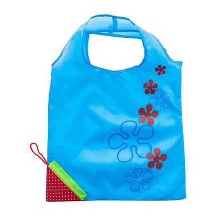 Creative Strawberry Reusable Folding Grocery Bag for Everyday Shopping compact blue nylon bag with floral print, folds into small strawberry pouch