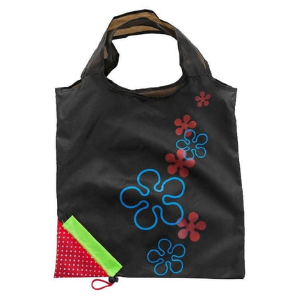 Creative Strawberry Reusable Folding Grocery Bag for Everyday Shopping — black nylon foldable bag with blue and red floral strawberry motif, folds into small red pouch