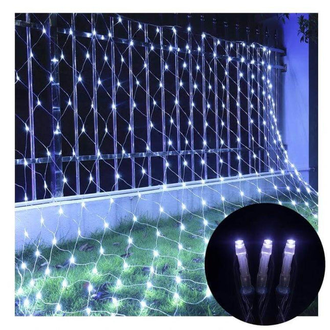 Curtain Net Lights For Outdoor Decor 4x6m 672 LEDs EU Plug draped over fence and lawn with cool white LEDs, IP44 outdoor net lighting