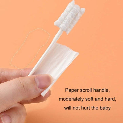 CUYUANSD Baby Tongue Cleaning Gauze Swabs, Spiral Pattern, 30 Pieces Per Can - close-up of sterile spiral gauze swab with paper shaft held between fingers for infant oral care