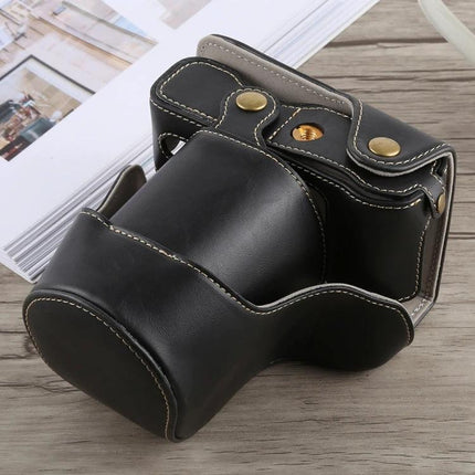 PU Leather Protective Case with Strap for Fujifilm X-A5 shown in black PU leather with stitched edges and brass hardware protecting camera body