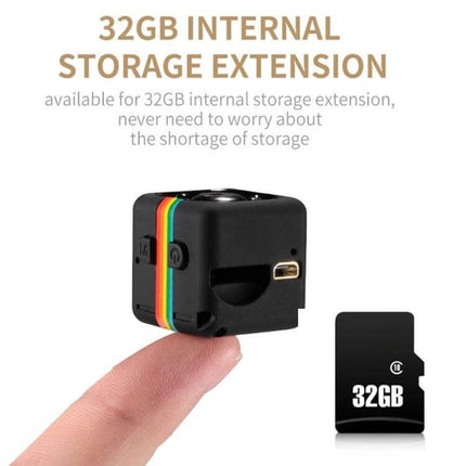 SQ11 Mini DV Camera with Night Vision for Outdoor Recording compact black cube camera on fingertip with 32GB storage card shown