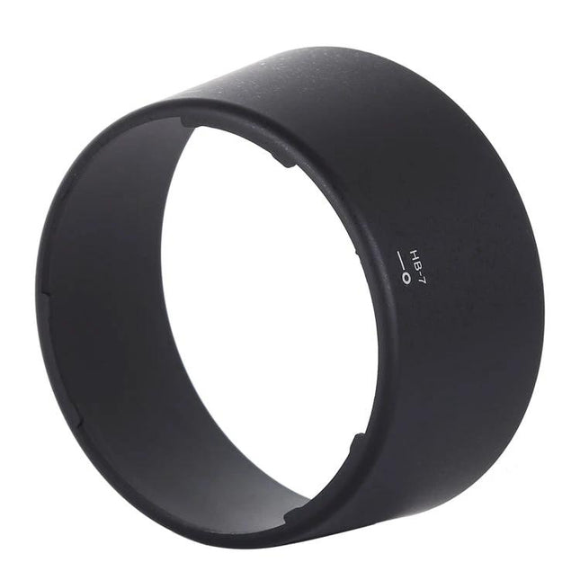 Protective Lens Hood for Nikon Camera Lenses and Protection — black round lens hood shielding lens from glare, dust and bumps