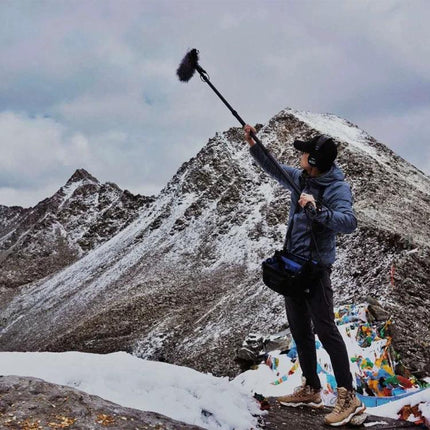 Deity Shotgun Microphone for Daily Vlogging and Interviews recording clear outdoor mountain interview with boom pole and windscreen