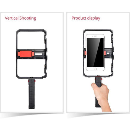 Handheld Cage for Smartphone Filming in Daily Life - black handheld cage with phone mounted for vertical vlogging and stable on-the-go recording