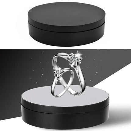 Compact 360 Degree Rotating Display Turntable for Photography and Video - black 138x35mm ABS platform showcasing jewelry with smooth rotation