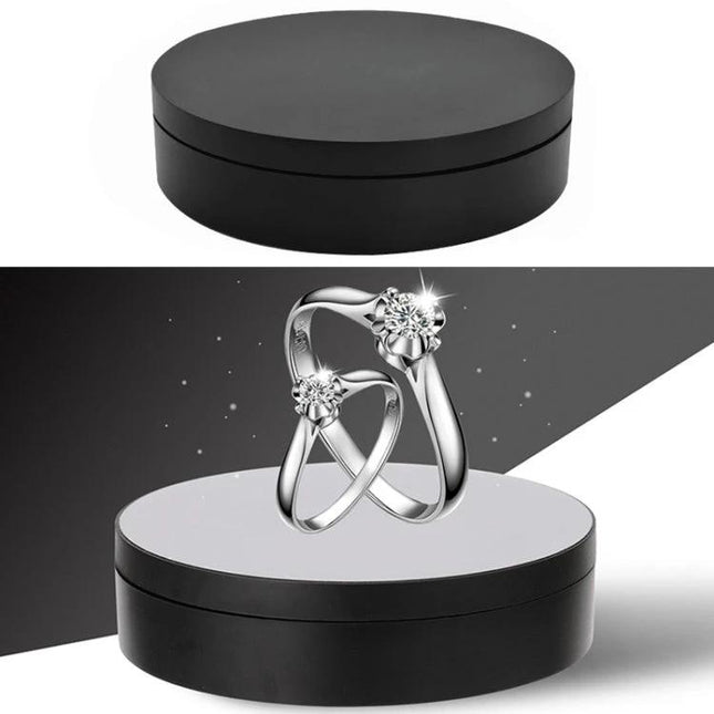 Compact 360 Degree Rotating Display Turntable for Photography and Video - black 138x35mm ABS platform showcasing jewelry with smooth rotation