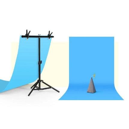 T-Shape Adjustable Photo Background Support Stand for Studios in black metal holding blue backdrops for studio photography setups