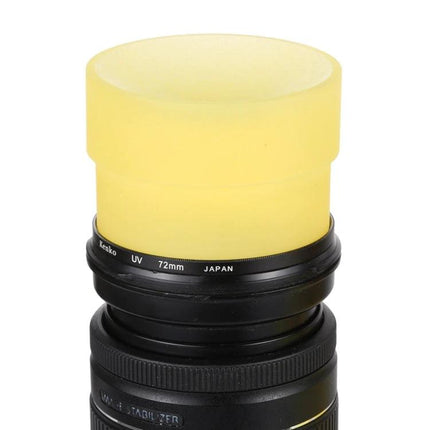 Versatile Multi-Size Camera Lens Filter Wrench Tool on black camera lens with yellow protective grip, durable beef tendon material for stuck filters