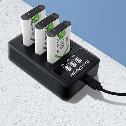 Sony NP-BX1 Battery Triple USB Charger with LCD Display showing three batteries in charger with LCD status screen