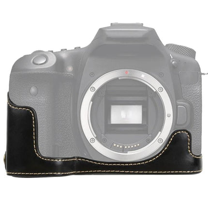 PU Leather Protective Half Case for Everyday Camera Use shown on Canon EOS 90D body — black PU leather half-case with contrast stitching