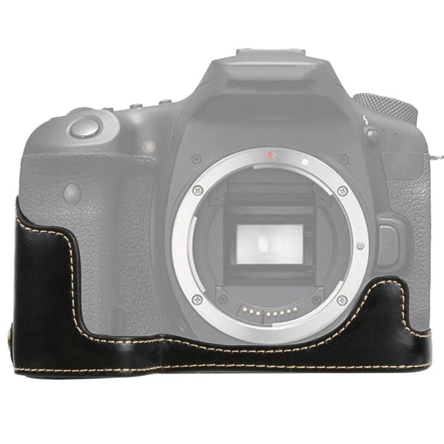 PU Leather Protective Half Case for Everyday Camera Use shown on Canon EOS 90D body — black PU leather half-case with contrast stitching