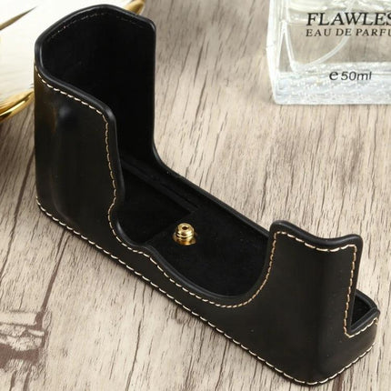 PU Leather Half Case with 1/4 Inch Thread for Fujifilm XE4 Camera - black PU leather protective half case with gold 1/4" thread