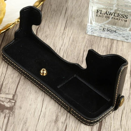 PU Leather Half Case with 1/4 Inch Thread for FUJIFILM X-T4 black PU leather half-case showing interior, suede lining and tripod screw mount