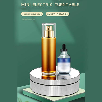 12cm Electric Rotating Display Stand for Product Showcasing with perfume bottle and dropper on rotating white platform