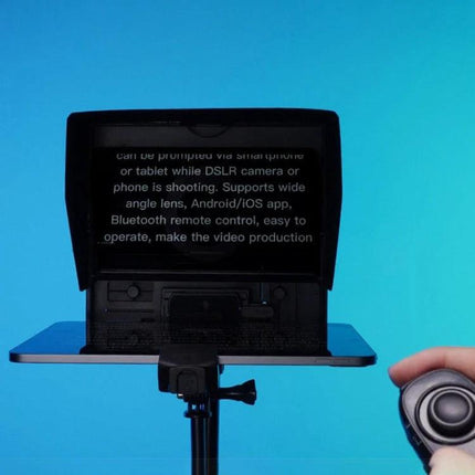 Feelworld 10-Inch Folding Teleprompter for Smartphone Video mounted on tripod displaying script with handheld remote