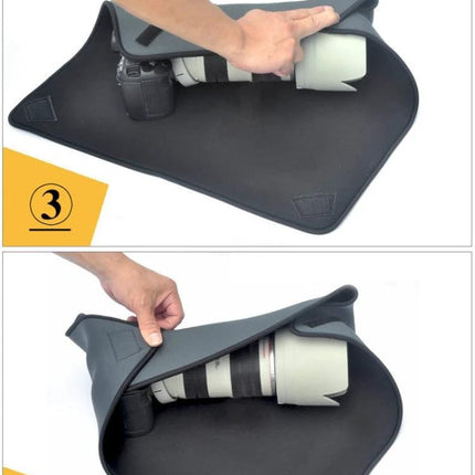 Neoprene Protective Blanket for Camera Lenses, 25x25cm wrapped around a DSLR and telephoto lens for padded protection and moisture resistance