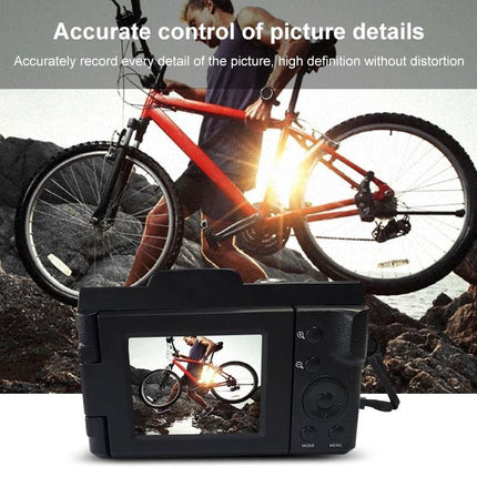 Compact Flip-Screen Selfie Camera for Everyday Photos and Videos showing bike sunset selfie on rotatable screen