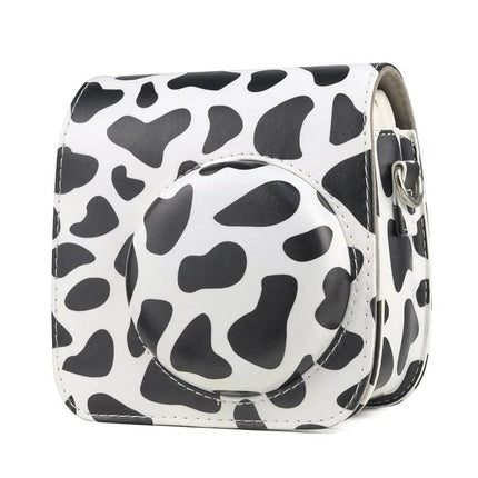 Milk Cow Full Body PU Leather Case for FUJIFILM Instax Mini 7+ in black and white cow print showing full protective cover and lens pouch