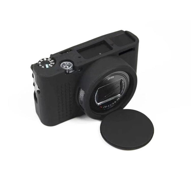 Durable Soft Silicone Protective Case for Sony Cyber-Shot Cameras in black fitted on compact camera with removable lens cap