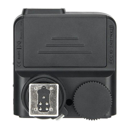Godox Wireless Flash Trigger for Pentax Photography - top view of black X2T-P hotshoe trigger showing sync port and control dial