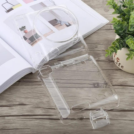 Crystal Protective Case with Strap for FUJIFILM Instax SQ6 clear durable cover shown on wooden table protecting camera with strap attachment