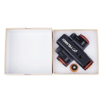 YELANGU Electric Camera Dolly for Video and Photo Recording compact black dolly with orange wheels in foam-lined box